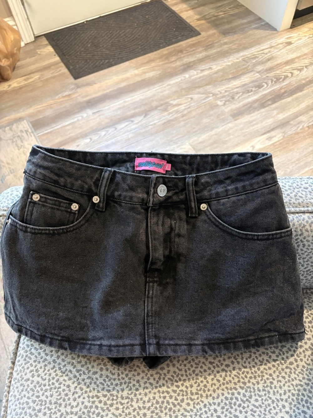Black denim mini skort